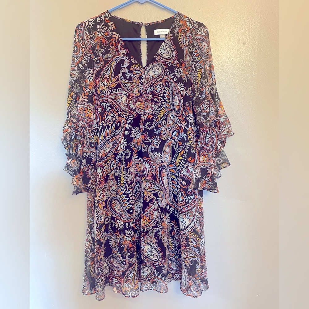 Like new beautiful Calvin Klein dress. Black with multi colors. Gorgeous!